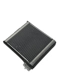 Air conditioning evaporator in silver with black trim close up on a white background