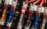 a close up image of car blade fuses and connectors