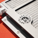 Metallic radiator with 'Classic Retro' branding on a red background