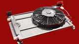 Car radiator with fan on a red background