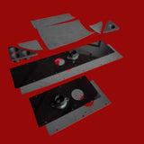 Black metal brackets and components on a red surface