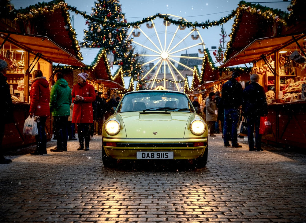 Vintage car on a festive street with Christmas decorations and a Ferris wheel in the background
