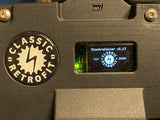 a close up of a digital screen on a smart electric air conditioning compressor showing home screen