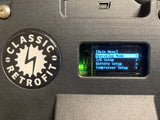 a close up of a digital screen on a smart electric air conditioning compressor showing operating mode