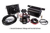 A range of components and parts that make up an electric air conditioning system for a porsche 911 
